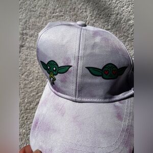 Baby Yoda baseball cap. Tie dye cap purple on white. 6 panel cap w 6 yoda faces.